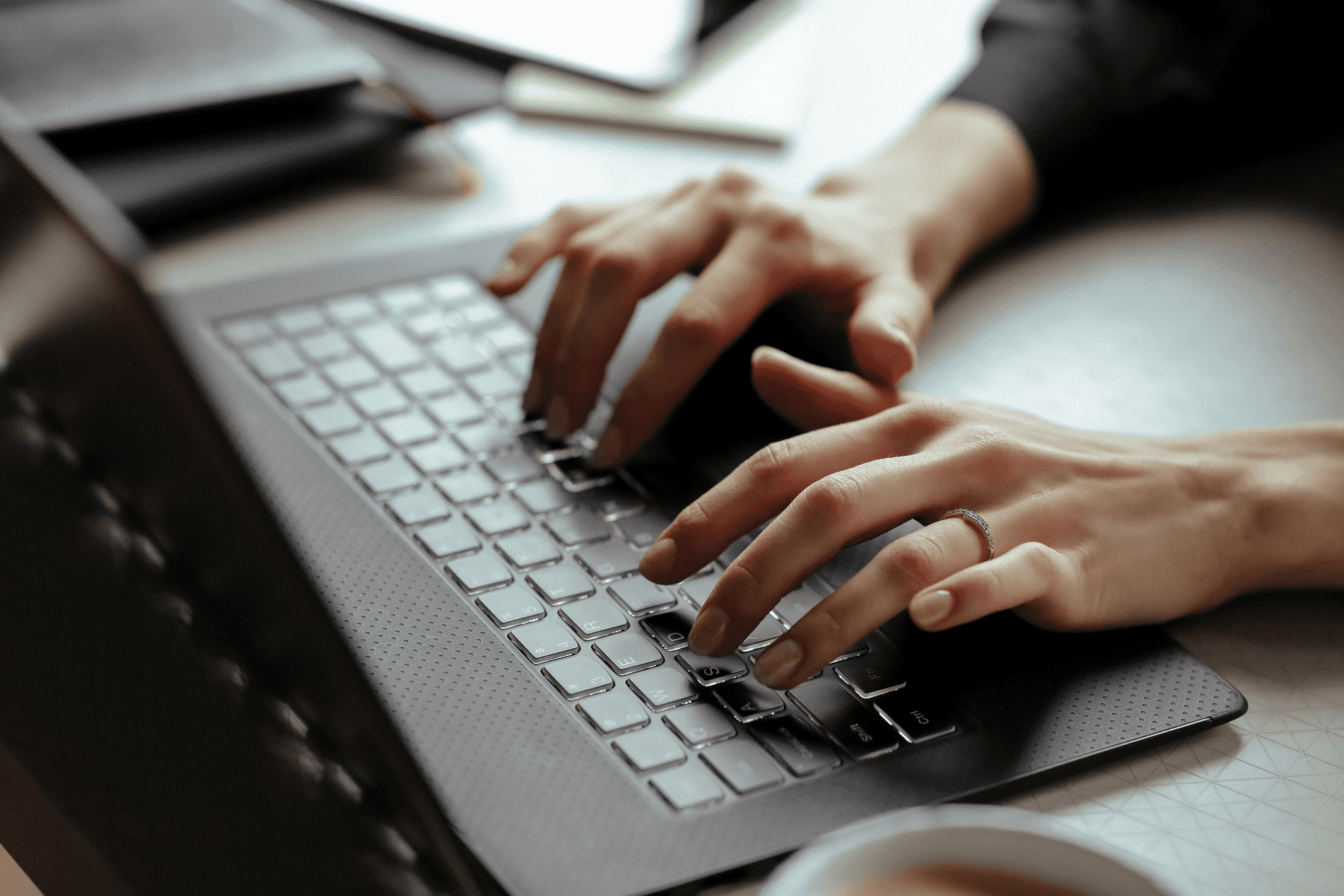 A lawyer typing on a keyboard.